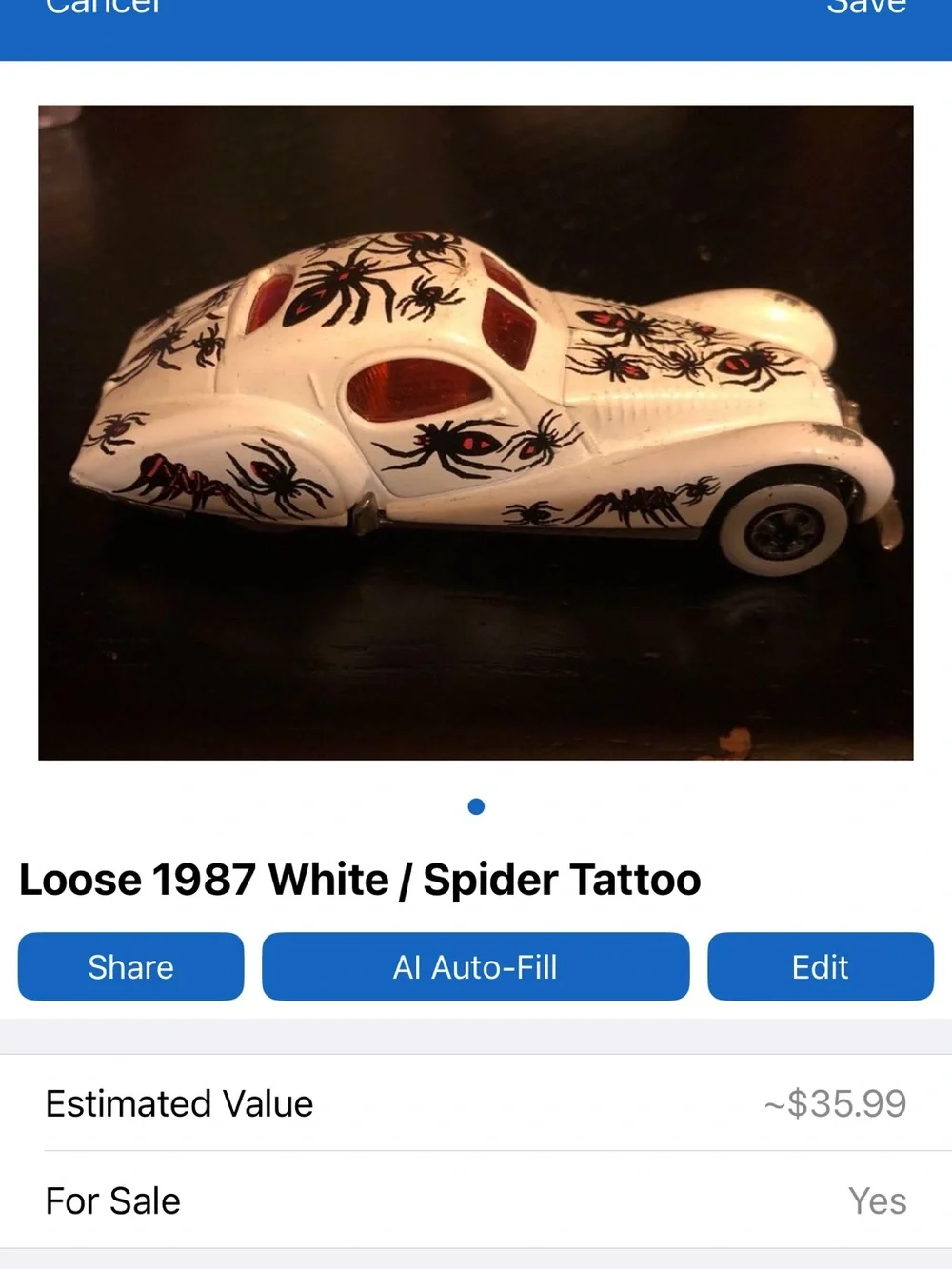 White Die-Cast Coupe with Black & Red Spider Decals